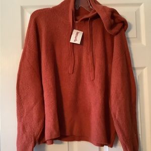 New sweater soft. With hood and tie